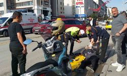 Motosiklet sürücüsü yola savruldu, cep telefonuyla iletişimini kesmedi