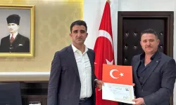 İpsala'dan Keşan’a atanan Müdür Karbuz’a Kaymakam Sevgili'den başarı belgesi