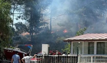 Marmaris'te orman yangını! Alevler yerleşim yerlerini tehdit ediyor